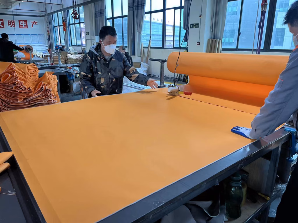 Silicone coated fire blanket cutting